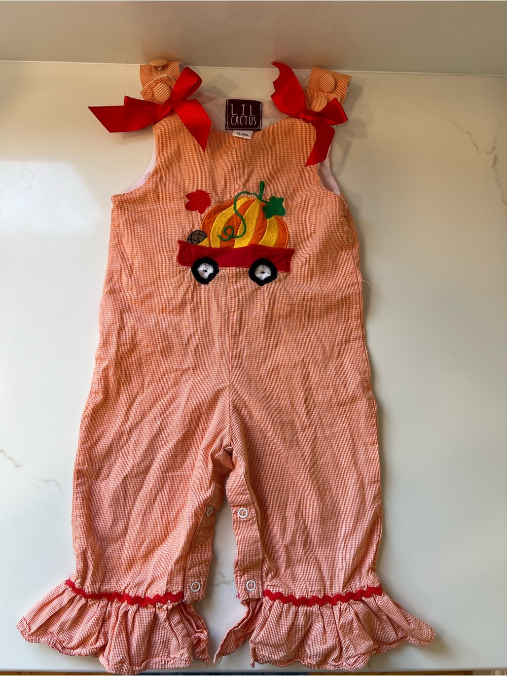 Lil Cactus Orange Pumpkin Wagon Seersucker Romper with Red Bows